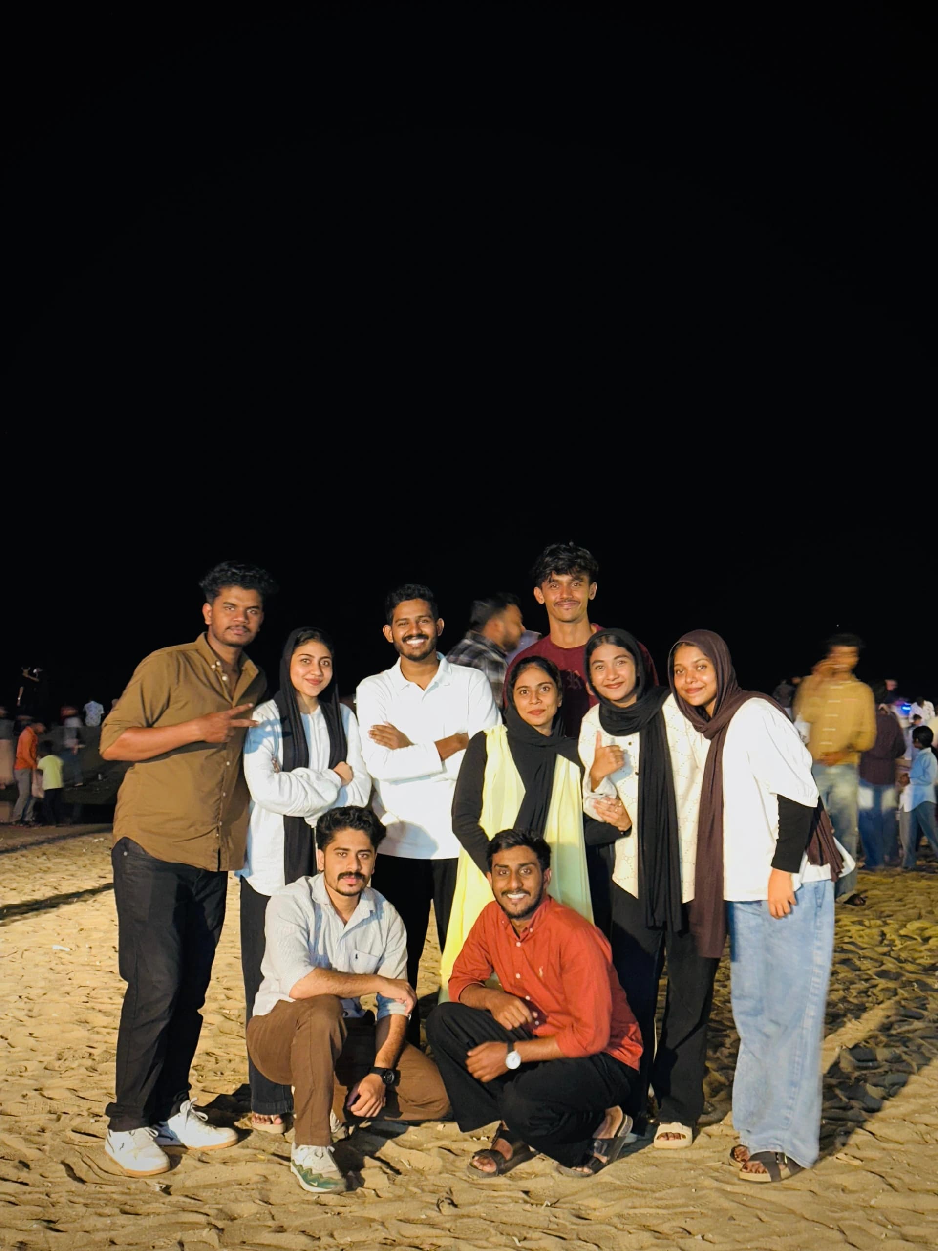Bdot team on a beach outing at night